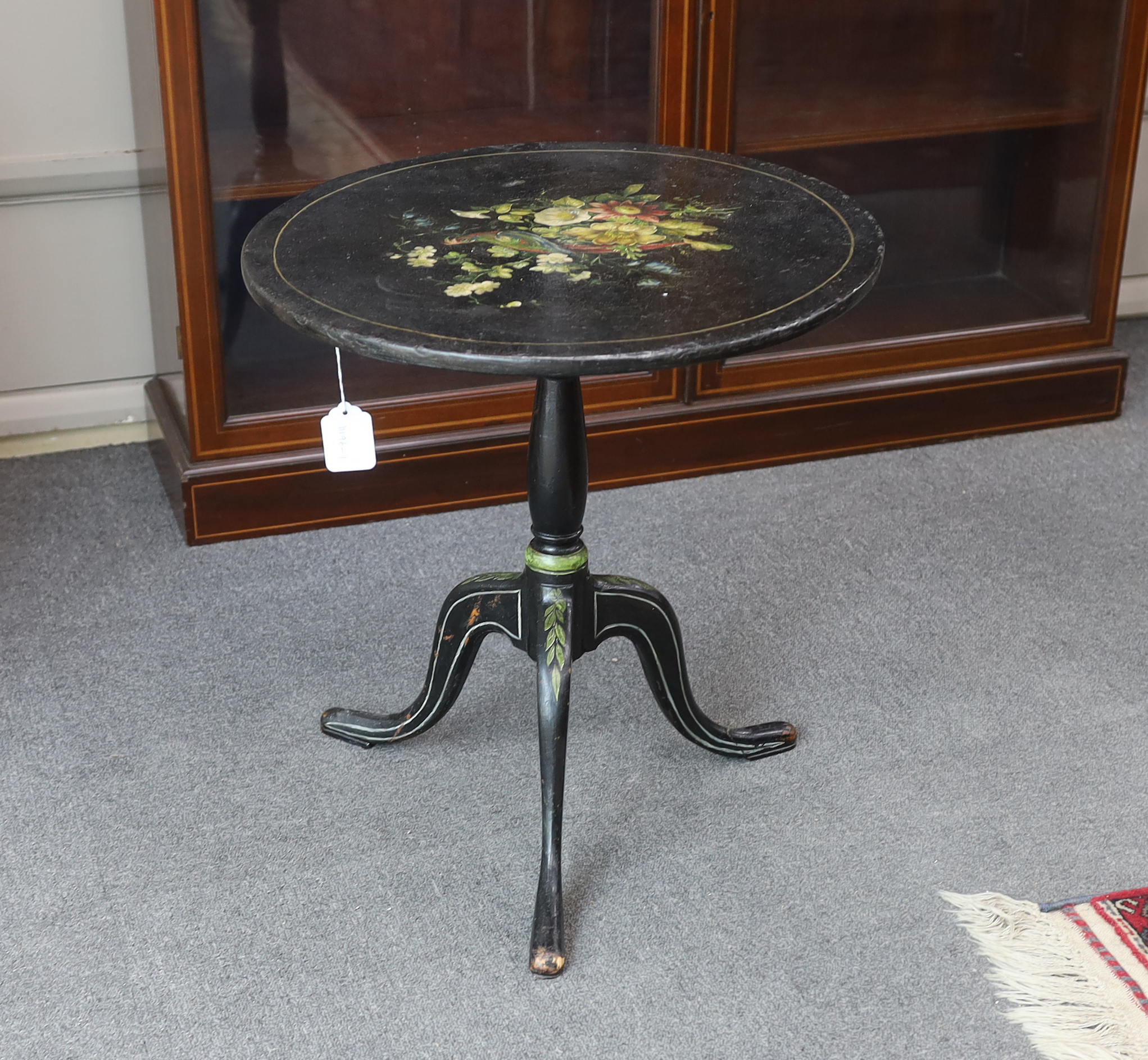 An early 19th century circular painted papier mache tripod wine table, diameter 50cm, height 53cm.
